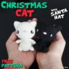 Christmas Cat with Santa Hat by Suzy Dias